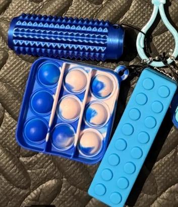 Stitch themed sensory lanyard with fidget toys and chewable item