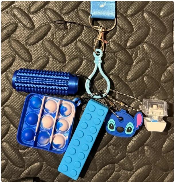 Stitch themed sensory lanyard with fidget toys and chewable item