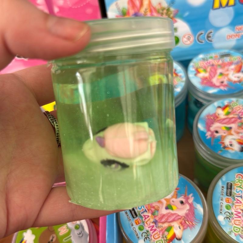 Crystal Unicorn putty slime with a unicorn figure hidden inside